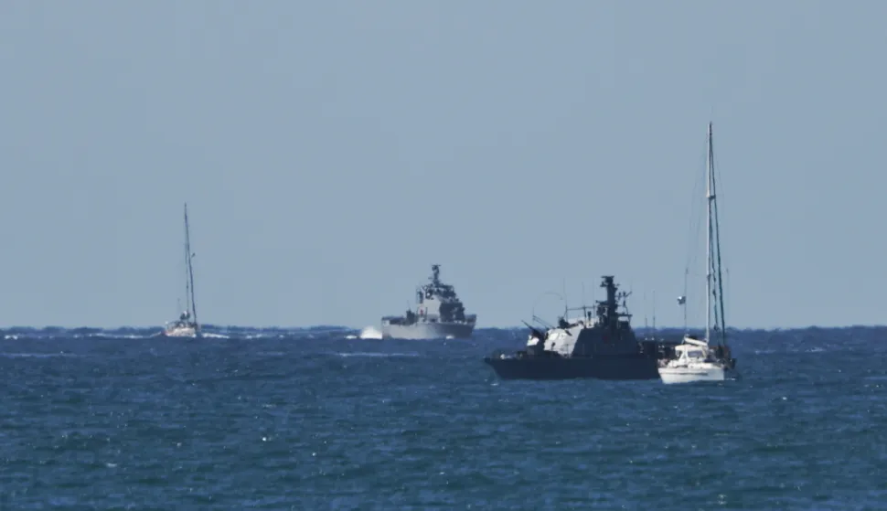 epa12423140 Vessels of the Global Sumud Flotilla arriving at Ashdod port 02 October 2025 after being intercepted whilst carrying aid to Gaza. Israel's Foreign Ministry announced that several vessels that form part of the Global Sumud Flotilla (GSF) had been stopped and that those aboard were being transferred to an Israeli port. EPA/ATEF SAFADI