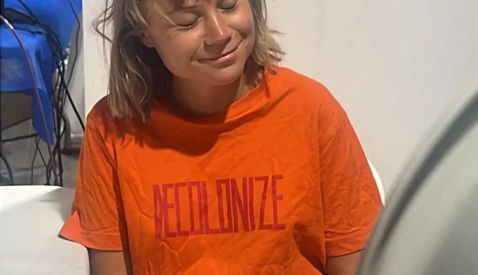 Swedish activist Greta Thunberg sits at an unknown location, after Israel intercepted the vessels of the Global Sumud Flotilla aiming to reach Gaza and break Israel's naval blockade, in this handout image released on October 3, 2025. ISRAEL FOREIGN MINISTRY/Handout via REUTERS THIS IMAGE HAS BEEN SUPPLIED BY A THIRD PARTY. NO RESALES. NO ARCHIVES. MANDATORY CREDIT. Photo: ISRAEL FOREIGN MINISTRY/REUTERS