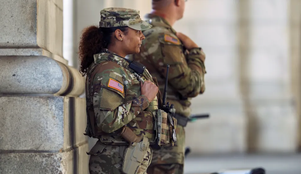 epa12322619 Members of the National Guard on patrol with sidearms at Union Station in Washington DC, USA, 25 August 2025. As the second week of U.S. President Donald Trump's takeover of Washington, D.C., policing begins, Mississippi joins three other Republican-led states that have vowed to deploy National Guard members in support of the Trump administration's operation. EPA/WILL OLIVER