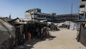 epa12432234 Internally displaced Palestinians gather among tents in Khan Younis, southern Gaza Strip, 5 October 2025. According to the UN around 90 percent of the population or 1.9 million people in Gaza have been displaced since the start of the conflict. More than 67,000 Palestinians have been killed in the Gaza Strip since October 2023, according to the Palestinian Ministry of Health, and about 1,200 Israelis have been killed since the launch of an Israeli military campaign in response to a cross-border attack by Hamas on 07 October 2023. EPA/HAITHAM IMAD