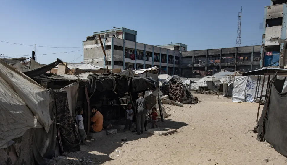 epa12432234 Internally displaced Palestinians gather among tents in Khan Younis, southern Gaza Strip, 5 October 2025. According to the UN around 90 percent of the population or 1.9 million people in Gaza have been displaced since the start of the conflict. More than 67,000 Palestinians have been killed in the Gaza Strip since October 2023, according to the Palestinian Ministry of Health, and about 1,200 Israelis have been killed since the launch of an Israeli military campaign in response to a cross-border attack by Hamas on 07 October 2023. EPA/HAITHAM IMAD