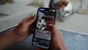 epa12420619 An Afghan man uses a mobile phone as internet and telecom services are gradually restoring after almost three days of closures in Kabul, Afghanistan, 01 October 2025. Afghanistan restored mobile networks and the internet on 01 October after a two-day nationwide shutdown ordered by Taliban authorities. The blackout halted businesses, banks, and travel, leaving the country nearly cut off. Netblocks called it a deliberate disconnection. Connectivity?s return sparked street celebrations in Kabul, with residents likening the moment to a holiday. EPA/SAMIULLAH POPAL