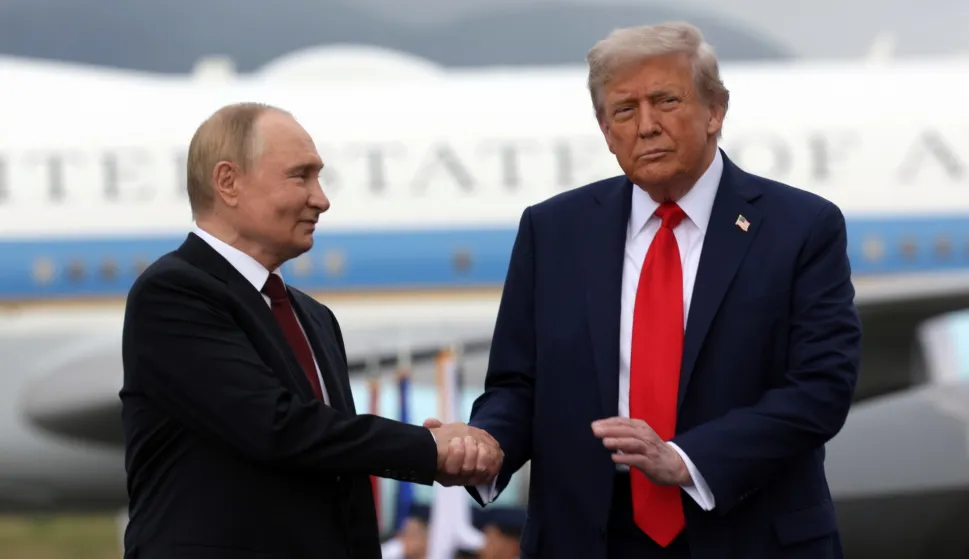 epa12303633 US President Donald Trump (R) and Russian President Vladimir Putin pose on the podium on the tarmac after they arrived to attend a meeting at Joint Base Elmendorf-Richardson in Anchorage, Alaska, USA, 15 August 2025. EPA/GAVRIIL GRIGOROV/SPUTNIK/KREMLIN POOL/POOL MANDATORY CREDIT