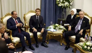 epa12450958 French President Emmanuel Macron (C) attends a meeting with Turkish President Recep Tayyip Erdogan (R) and Egyptian President Abdel Fattah al-Sissi (L) at the Gaza Peace Summit in Sharm El-Sheikh, Egypt, 13 October 2025. US President Donald Trump alongside Egypt's President Abdel Fattah al-Sisi with leaders from more than 20 countries attend the summit in Sharm El-Sheikh. The first phase of Gaza peace plan between Israel and Hamas involves the release of Israeli hostages and Palestinian prisoners, the partial withdrawal of Israeli forces, and the delivery of humanitarian aid to Gaza. EPA/YOAN VALAT/POOL