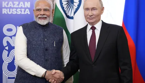 epa11674423 Russian President Vladimir Putin (R) and Indian Prime Minister Narendra Modi shake hands during their meeting on the sidelines of BRICS Summit at Kazan Kremlin in Kazan, Russia, 22 October 2024. The BRICS summit takes place from 22 to 24 October and is expected to be the largest foreign policy event ever held in Russia. EPA/ALEXANDER ZEMLIANICHENKO/POOL