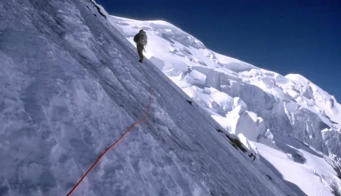 Shawn O'Fallon of Anchorage, Alaska, climbs the North Ridge of K2 in the Xinjiang Province of China during the summer of 2000. Mountaineers are bringing back firsthand accounts of vanishing glaciers, melting ice routes, crumbling rock formations and flood-prone lakes where glaciers once rose. The observations are transforming a growing number of alpine and ice climbers, some of whom have scientific training, into eyewitnesses of global warming. (AP Photo/John Heilprin)