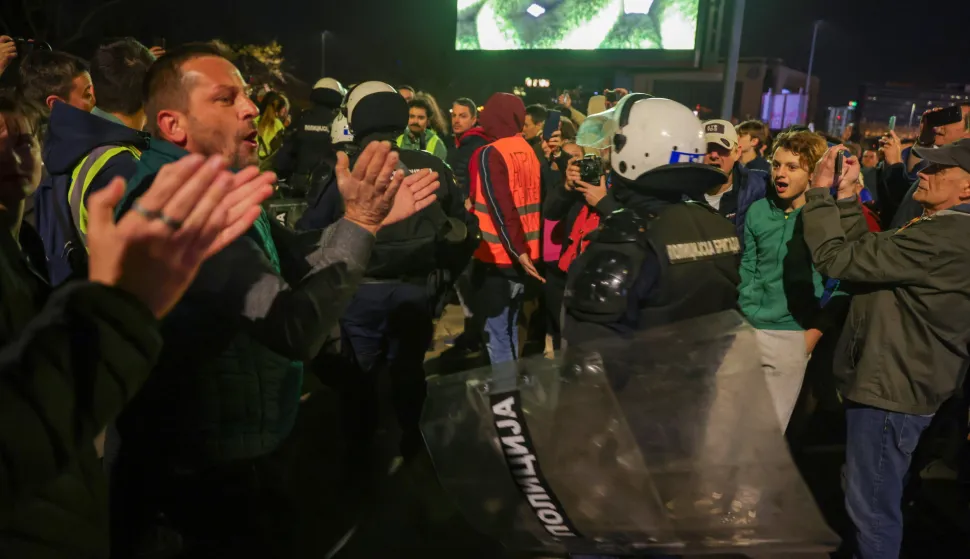 epa11950161 Protestors stand-off with riot police officers during a rally in Belgrade, Serbia, 08 March 2025. University students and workers rally in joint solidarity in Belgrade on International Women's Day, demanding accountability after fifteen people lost their lives in the collapse of the Novi Sad Railway Station canopy in November 2024. The station building, which had been renovated and reopened in July 2024, was undergoing further renovations shortly before the collapse. EPA/ANDREJ CUKIC
