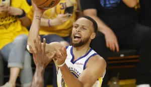 epa09992990 Golden State Warriors guard Stephen Curry (R), shoots over defending Boston Celtics center Al Horford (L), during the first quarter of Game 1 of the National Basketball Association (NBA) Finals between the Golden State Warriors and the Boston Celtics outside Chase Center, in San Francisco, California, USA, 02 June 2022. EPA/JOHN G. MABANGLO SHUTTERSTOCK OUT