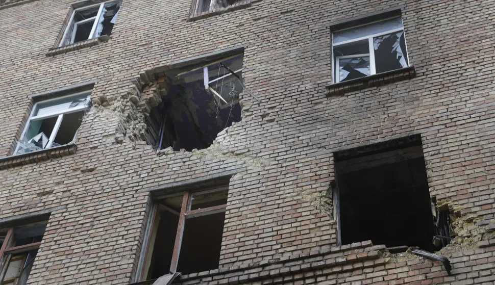 epa12472175 The scene of a damaged residential building after an overnight Russian strike in Kyiv, Ukraine, 22 October 2025, amid the ongoing Russian invasion. At least two people were killed and more than 20 others injured, including five children, after Russian strikes on Kyiv, the State Emergency Service of Ukraine reported. Across Ukraine, the attacks killed at least seven people, including two children, with regions including Kyiv, Odesa, Chernihiv, Dnipropetrovsk, Kirovohrad, Poltava, Vinnytsia, Zaporizhia, Cherkasy, and Sumy affected, according to President Zelensky. EPA/SERGEY DOLZHENKO