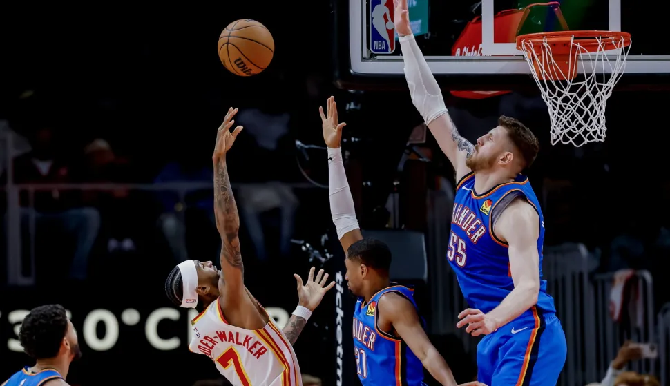 epaselect epa12482877 Atlanta Hawks guard Nickeil Alexander-Walker (2-L) in action against Oklahoma City Thunder guard Aaron Wiggins (C) and Thunder center Isaiah Hartenstein (R) during the second half of an NBA basketball game between the Oklahoma City Thunder and the Atlanta Hawks in Atlanta, Georgia, USA, 25 October 2025. EPA/ERIK S. LESSER SHUTTERSTOCK OUT