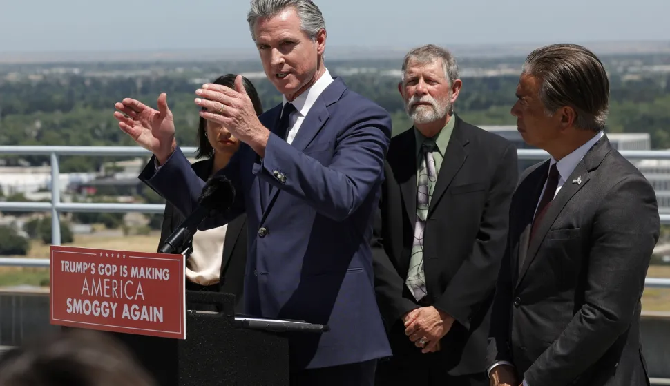 epa12126879 California Governor Gavin Newsom (2-L), Attorney General Rob Bonta (R), CalEPA Secretary Yana Garcia (L) and Dr. John Balmes (2-R), supporters of California's clean air efforts responds to the US Senate's votes to kill California's electric car mandate during a press conference in Sacramento, California, USA, 22 May 2025. Attorney General Rob Bonta announced that California will bring a lawsuit against the Trump Administration. EPA/JOHN G. MABANGLO