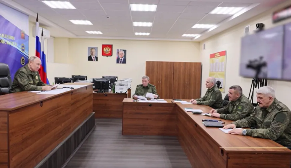 epa12483287 A handout photo made from video released by the Russian Presidential Press Office on 26 October 2025 shows, Russian President Vladimir Putin (L) and Chief of the General Staff of the Russian Armed Forces - First Deputy Defence Minister Valery Gerasimov (C) during his visit to one of the command posts of the Joint Group of Forces, at an undisclosed location. EPA/RUSSIAN PRESIDENTIAL PRESS OFFICE/HANDOUT MANDATORY CREDIT HANDOUT EDITORIAL USE ONLY/NO SALES