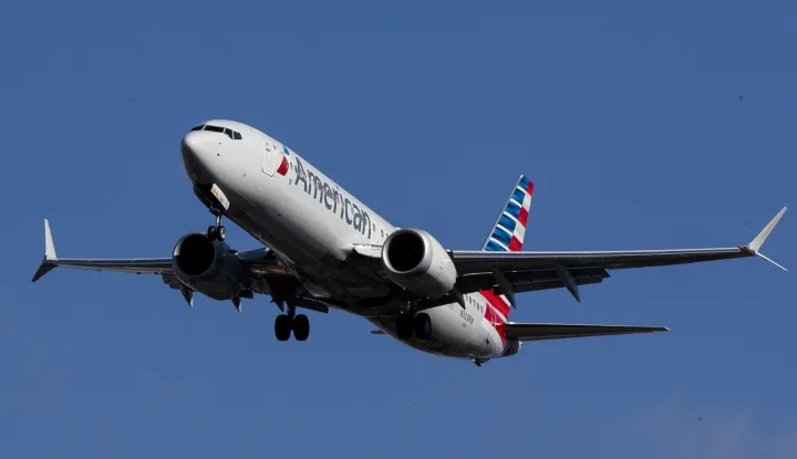 epa07432162 An American Airlines Boeing 737 Max 8 (Tail Number N323RM) lands at LaGuardia Airport in New York, New York, USA, 12 March 2019. Multiple countries around the world have ground the Boeing 737 Max 8 planes following two separate crashes involving the model. EPA/JUSTIN LANE