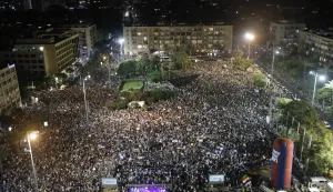 epa06927639 People take part in a demonstration by the Druze community against the controversial 'Nationality Bill' in Rabin square in Tel Aviv, Israel, 04 August 2018. The controversial Bill passed in the Knesset Israeli parliament) on 19 July legally redefine Israel status as a 'Jewish state with democratic regime' instead of the official status 'Jewish and democratic state'. Reportsa state that the Bill aroused great criticism from non-Jewish communities living in Israel, mainly the Druze community that serve in the Israeli Army, claiming inequality. EPA/ABIR SULTAN