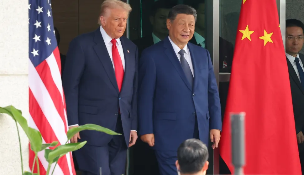 epa12492356 US President Donald Trump (L) and Chinese President Xi Jinping (C) emerge from their talks at the Naraemaru reception hall inside an Air Force base in Busan, South Korea, 30 October 2025. EPA/YONHAP SOUTH KOREA OUT