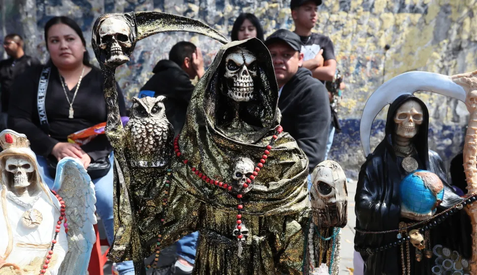 epa12496460 Images of Santa Muerte at the shrine on Alfareria Street in Mexico City, Mexico, 31 October 2025. EPA/MARIO GUZMAN