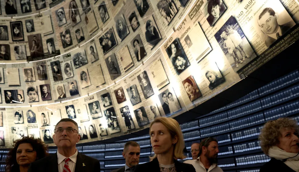 epa11985200 EU High Representative for Foreign Affairs and Security Policy Kaja Kallas (C) and Israeli Foreign Minister Gideon Sa'ar (L) during a visit at Yad Vashem, Israel's Holocaust History Museum, in Jerusalem, 24 March 2025. The EU top diplomat is on a visit to Israel and the West Bank. EPA/ATEF SAFADI