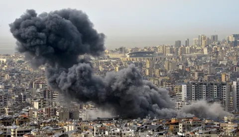 epa11994967 Smoke is seen billowing over buildings in Dahieh, southern Beirut, Lebanon, 28 March 2025. At least two missiles hit a building in the Hadath area, which was destroyed by the attack after an Israeli military warning earlier on 28 March, according to the Lebanese National News Agency (NNA). EPA/WAEL HAMZEH