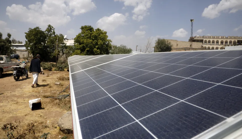 epa10493984 A Yemeni passes an array of photovoltaic panels installed to power a water pump at a farm, on World Sustainable Energy Day, in Sana'a, Yemen, 27 February 2023. Many Yemenis have been using sustainable solar energy systems to power basic services after public services electricity in war-ravaged Yemen collapsed due to severe fuel shortages and skyrocketing prices since the war escalated in 2015. World Sustainable Energy Day is observed on 27 February each year across the world to create awareness among the people about the importance of the conservation of energy for future use. EPA/YAHYA ARHAB