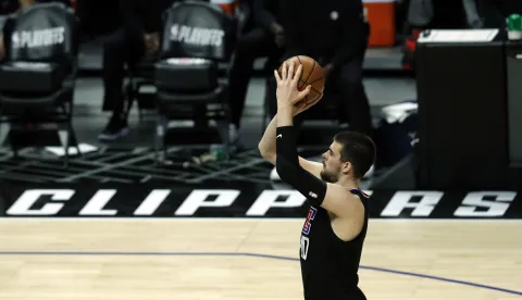 epa09272213 LA Clippers center Ivica Zubac misses a free throw during the fourth quarter of the game 4 of the NBA playoffs between the Utah Jazz and the Los Angeles Clippers at the Staples Center in Los Angeles, California, USA, 14 June 2021. EPA/ETIENNE LAURENT SHUTTERSTOCK 