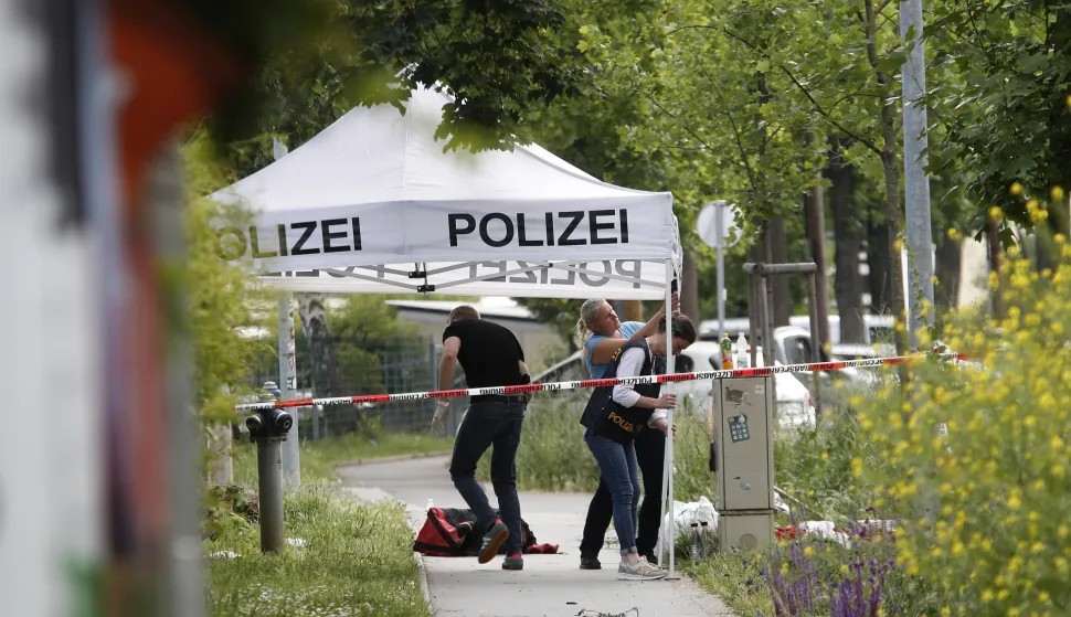 epa12168274 Police officers conduct investigation at the Dreierschutzengasse high school following a shooting in Graz, Austria, 10 June 2025. At least nine people were killed in the incident, including the shooter, authorities confirmed. EPA/ANTONIO BAT