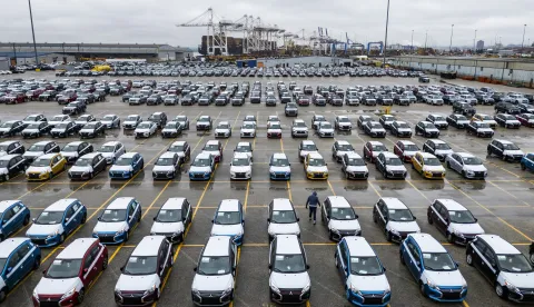 epa12016592 An image taken with a drone shows new Mitsubishi automobiles awaiting transport from the Dundalk Marine Terminal in Baltimore, Maryland, USA, 07 April 2025. In an attempt to bolster US auto production, the Trump administration has placed a 25 percent tariff on imported cars and car parts. EPA/JIM LO SCALZO