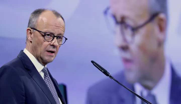 epa12531029 German Chancellor Friedrich Merz speaks during economy congress 'SZ-Wirtschaftsgipfel' organised by German daily newspaper 'Sueddeutsche Zeitung' in Berlin, Germany, 17 November 2025. EPA/HANNIBAL HANSCHKE
