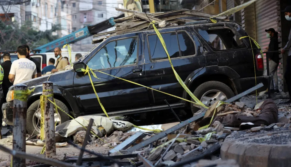 epa12544384 A damaged car at the site after an Israeli airstrike on the southern suburbs of Beirut, Lebanon, 23 November 2025. The Israeli army announced that it had conducted a precise strike targeting a key member of Hezbollah in Beirut. EPA/WAEL HAMZEH