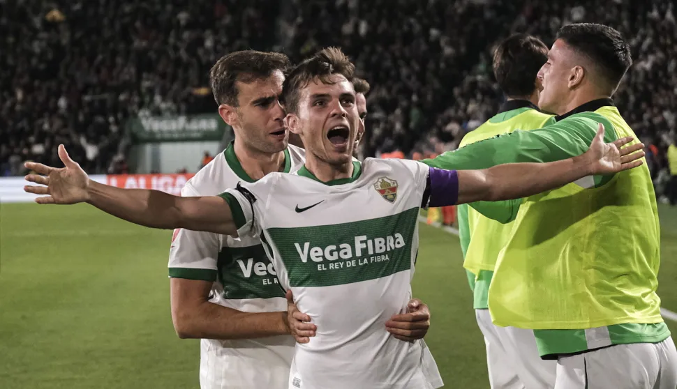 epa12544871 Elche CF's Aleix Febas (2L) celebrates after scoring the 1-0 lead during the Spanish LaLiga soccer match between Elche CF and Real Madrid at the Martinez Valero stadium in Elche, Spain, 23 November 2025. EPA/Manuel Bruque