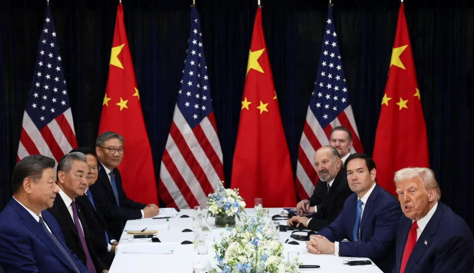 U.S. President Donald Trump, accompanied by U.S. Secretary of State Marco Rubio, and U.S. Secretary of Commerce Howard Lutnick, attends a bilateral meeting with Chinese President Xi Jinping, accompanied by Chinese Foreign Minister Wang Yi, at Gimhae International Airport, on the sidelines of the Asia-Pacific Economic Cooperation (APEC) summit, in Busan, South Korea, October 30, 2025. REUTERS/Evelyn Hockstein Photo: Evelyn Hockstein/REUTERS
