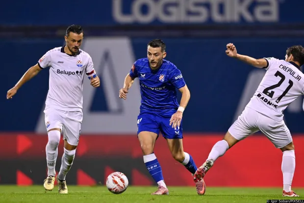 28.09.2025., stadion Maksimir, Zagreb - SuperSport HNL, 08. kolo, GNK Dinamo - NK Slaven Belupo. Tomislav Bozic i Arber Hoxha Photo: Igor Soban/PIXSELL