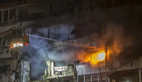 epa12547120 Ukrainian rescuers work at the site of a Russian strike on a nine-storey residential building in Kyiv, Ukraine, 25 November 2025, amid the Russian invasion. At least six people were killed and dozens of others injured, including two children, in an overnight combined Russian attack on Kyiv, according to the State Emergency Service report. EPA/MAXYM MARUSENKO