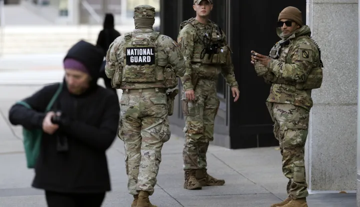 epa12555569 National Guard members stand close to the scene, where two National Guard members were shot in Washington, DC USA, 28 November 2025. US President Trump announced on 27 November that National Guard member Sarah Beckstrom died of her injuries following a shooting in Washington on 26 November, another National Guard member Andrew Wolfe remains in hospital. EPA/WILL OLIVER