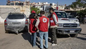 epa12549932 The Gaza Ministry of Health receives from the Red Cross the remains and bodies of unidentified Palestinians returned by Israel, to be buried in a mass funeral outside Nasser Hospital in Khan Younis, southern Gaza Strip, on 26 November 2025. The handover of the bodies of deceased Palestinian prisoners by Israel comes as part of the ceasefire agreement between Israel and Hamas that went into effect on 10 October 2025. EPA/HAITHAM IMAD