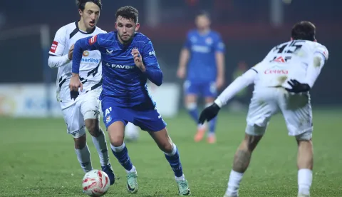 01.12.2025., Gradski stadion, Velika Gorica - SuperSport HNL, 15. kolo, HNK Gorica - GNK Dinamo. Ognjen Bakic i Fran Topic Photo: Slavko Midzor/PIXSELL