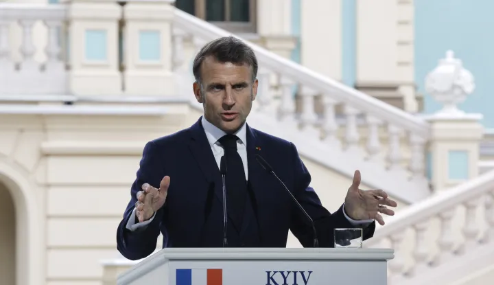 epa12088737 France's President Emmanuel Macron gestures as he addresses a joint press conference following a meeting of the 'Coalition of the willing' at the Mariinskyi Palace, the official residence of the president of Ukraine, in Kyiv, Ukraine, 10 May 2025, amid the ongoing Russian invasion. EPA/SERGEY DOLZHENKO