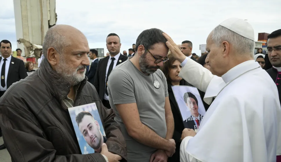 epa12563900 A handout picture provided by the Vatican Media shows Pope Leo XIV blessing relatives of victims during his visit to the site of the Beirut port blast of August 2020, during his first apostolic journey, in Beirut, Lebanon, 02 December 2025. Pope Leo XIV is on his first apostolic visit outside Italy since his election as pontiff. He visited Turkey from 27 November and continues his journey to Lebanon from 30 November until 02 December. EPA/VATICAN MEDIA HANDOUT HANDOUT EDITORIAL USE ONLY/NO SALES