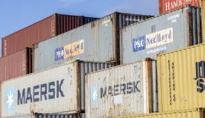 epa12084332 Shipping containers are stacked at a container terminal near the Miami International Airport in Miami, Florida, USA, 08 May 2025. During his second presidency, US President Donald Trump significantly expanded the use of protective tariffs, intensifying his 'America First' trade program. These tariffs were designed to shield US industries from foreign competition, particularly targeting countries like China, but also extending to allies such as Canada, Mexico, and European nations. EPA/CRISTOBAL HERRERA-ULASHKEVICH