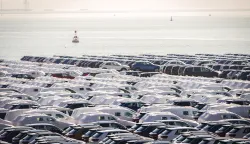 epa07164772 Vehicles parked in the harbour of Setubal wait to be dispatched during the strike of the dockers in Setubal, Portugal, 14 November 2018. A group of precarious dock workers from Dockers' Union and the Logistics Activity (SEAL) triggered a labor dispute with the port work company Operestiva, which affects several companies, including Autoeuropa. EPA/ANDRE AREIAS
