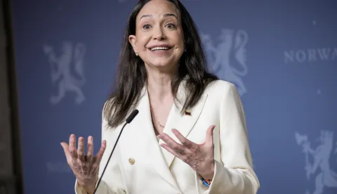 epa12584557 Nobel Peace Prize laureate Maria Corina Machado (L) speaks during a press conference with Norway's Prime Minister Jonas Gahr Store (not pictured) at the government's representative facilities in Oslo, Norway, 11 December 2025. She received the Nobel Peace Prize 2025 for her tireless work promoting democratic rights for the people of Venezuela and for her struggle to achieve a just and peaceful transition from dictatorship to democracy. Due to the situation in Venezuela, she was unable to attend the award ceremony. EPA/STIAN LYSBERG SOLUM NORWAY OUT