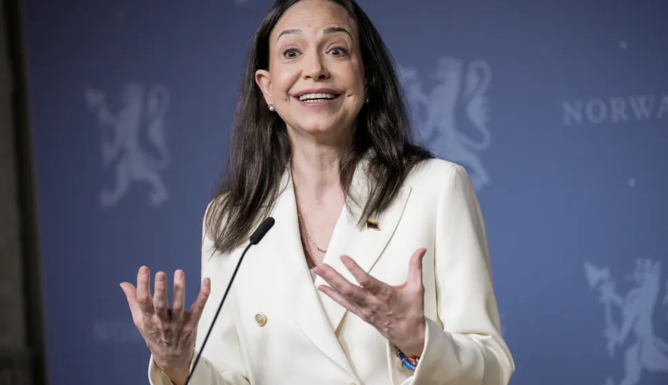 epa12584557 Nobel Peace Prize laureate Maria Corina Machado (L) speaks during a press conference with Norway's Prime Minister Jonas Gahr Store (not pictured) at the government's representative facilities in Oslo, Norway, 11 December 2025. She received the Nobel Peace Prize 2025 for her tireless work promoting democratic rights for the people of Venezuela and for her struggle to achieve a just and peaceful transition from dictatorship to democracy. Due to the situation in Venezuela, she was unable to attend the award ceremony. EPA/STIAN LYSBERG SOLUM NORWAY OUT