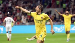 epa12377474 AC Milan's Luka Modric celebrates scoring the 1-0 goal during the Italian Serie A soccer match between AC Milan and Bologna FC 1909, in Milan, Italy, 14 September 2025. EPA/MATTEO BAZZI