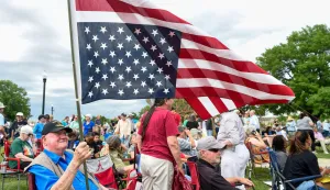 Vietnam Veteran Jim Taylor holds his American flag upside down as a sign of distress during the Tide Against Trump rally at Snow Hinton Park in Tuscaloosa, Ala., on Thursday May 1, 2025, during President Donald Trump's visit to the University of Alabama campus. (Photo by Mickey Welsh/Advertiser/USA TODAY NETWORK via Imagn Images/Sipa USA) Photo: USA TODAY/SIPA USA
