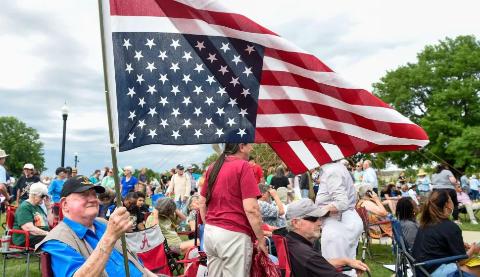 Vietnam Veteran Jim Taylor holds his American flag upside down as a sign of distress during the Tide Against Trump rally at Snow Hinton Park in Tuscaloosa, Ala., on Thursday May 1, 2025, during President Donald Trump's visit to the University of Alabama campus. (Photo by Mickey Welsh/Advertiser/USA TODAY NETWORK via Imagn Images/Sipa USA) Photo: USA TODAY/SIPA USA