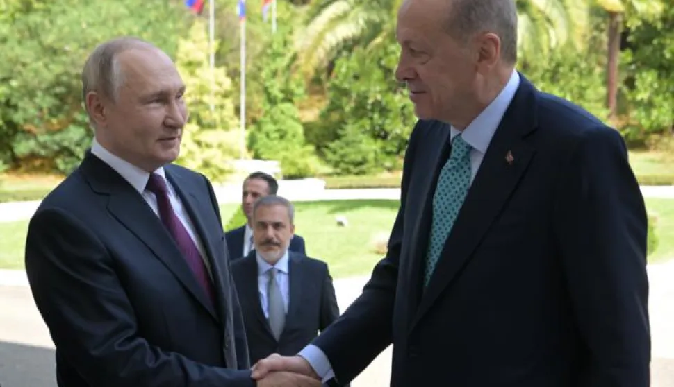 epa10839844 Russian President Vladimir Putin (L) welcomes Turkey's President Recep Tayyip Erdogan (R) prior to their meeting in Sochi, Russia, 04 September 2023. Putin said that Russia is open to negotiations on the 'grain deal'. EPA/ALEKSEY NIKOLSKYI/SPUTNIK/KREMLIN POOL MANDATORY CREDIT