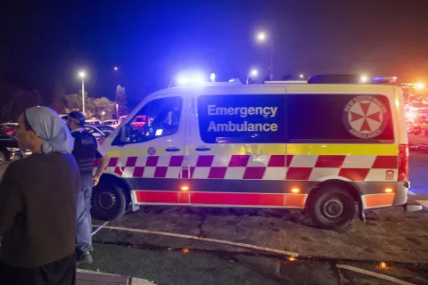 epa12591117 Emergency services work near the scene following a shooting incident at Bondi Beach, in Sydney, New South Wales (NSW), Australia, 14 December 2025. NSW Police confirmed at least ten deaths, including one alleged shooter, following the incident at Bondi Beach. Eleven others were injured, including two police officers. Authorities said the second alleged shooter remains in critical condition and is in custody. EPA/JEREMY PIPER AUSTRALIA AND NEW ZEALAND OUT