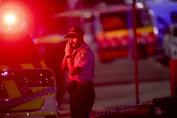 epa12591108 A police officer near the scene following a shooting incident at Bondi Beach, in Sydney, New South Wales (NSW), Australia, 14 December 2025. NSW Police confirmed at least ten deaths, including one alleged shooter, following the incident at Bondi Beach. Eleven others were injured, including two police officers. Authorities said the second alleged shooter remains in critical condition and is in custody. EPA/JEREMY PIPER AUSTRALIA AND NEW ZEALAND OUT