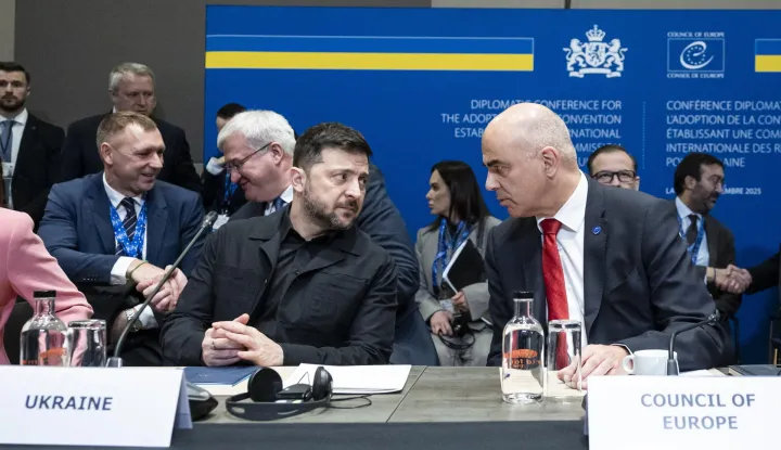 epa12596083 The Secretary General of the Council of Europe, Alain Berset (R), and Ukrainian President Volodymyr Zelensky (L) attend a Council of Europe meeting at the World Forum in The Hague, Netherlands, 16 December 2025. During the conference, European allies are set to discuss compensation for Ukraine for the consequences of Russian aggression. EPA/SEM VAN DER WAL