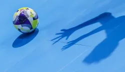 (251126) -- PASIG CITY, Nov. 26, 2025 (Xinhua) -- The shadow of goalkeeper Inoue Nene of Japan is seen as she competes during the group C match between Portugal and Japan at the FIFA Futsal Women's World Cup 2025 in Pasig City, the Philippines, on Nov. 26, 2025. (Xinhua/Rouelle Umali) Photo: ROUELLE UMALI/XINHUA