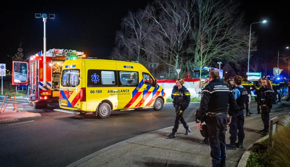epa12609172 Emergency services work at the scene of an accident on the Elburgerweg in Nunspeet, the Netherlands, 22 December 2025. According to police, a car drove into a group of people injuring at least nine people, including three with serious wounds. EPA/ROLAND HEITINK